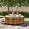 Outsunny 4 Person Inflatable Portable Hot Tub Outdoor Round Heated Spa with 108 Jets, Pump, Cover, Filter Cartridges, Brown
